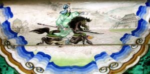 Guan Yu mounted on a horse with a guandao in his hand